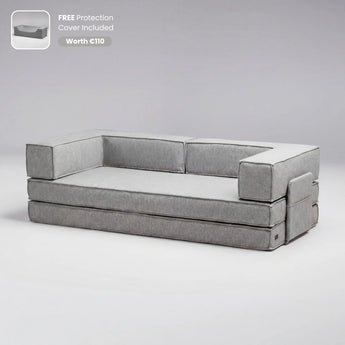 Gray sectional sofa on a light gray background with a free protection cover offer.