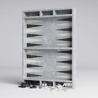 Marble backgammon board with pieces on a light gray background