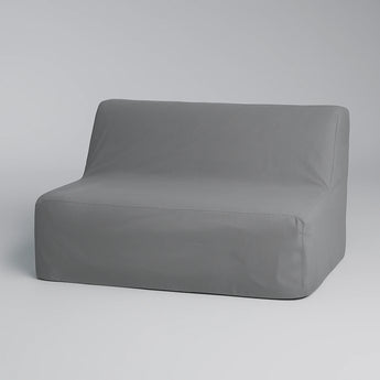 Gray corner chair on a light gray background