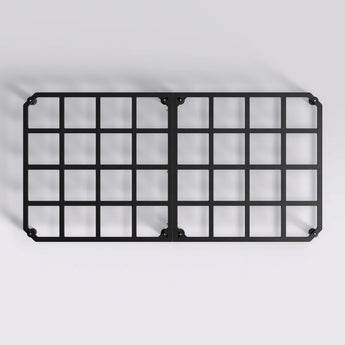 Black metal grid on a gray background