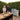 Troispommes outdoor dining table in lifestyle garden setting