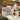 Family cooking at Troispommes outdoor kitchen and BBQ grill