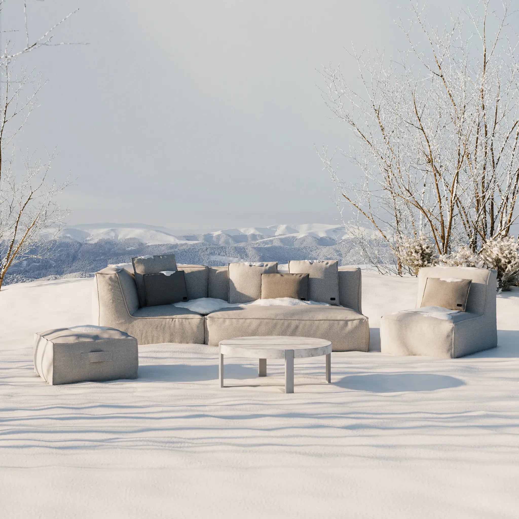 Troispommes outdoor lounge set on patio in winter snow landscape